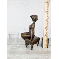 Statuette "In a negligee on an ottoman (EPA-515)"