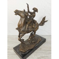 Sculpture "Cowboy with a gun"