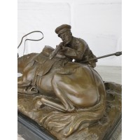 Sculpture "Cossack shooting from behind a horse"
