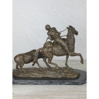 The statuette "The Hunter and the cow"