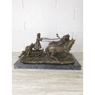 Sculpture "Sleigh three with two riders"