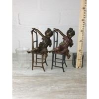 Statuette "A girl with a kitten on a chair (color)"