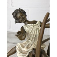 Statuette "A girl with a kitten on a chair 2 (color)"