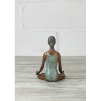 The statuette "Meditating (color.)"