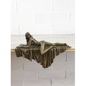 Statuette "Naked on a bedspread (on a shelf)"