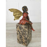 The statuette "Thumbelina (legs dangled)"