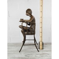 Statuette "On a chair with a bird (large)"