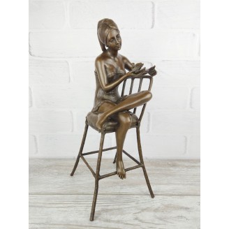 Statuette "On a chair with a bird (large)"