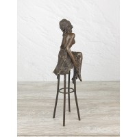 Statuette "On a chair in a cape (VA-105)"