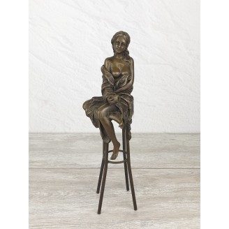 Statuette "On a chair with an apple (VA-103)"