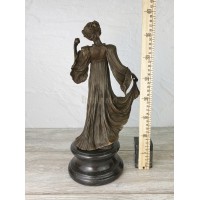 Statuette "Dancer in a long dress (with an apple)"