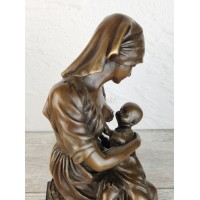 Sculpture "A young mother from Boulogne, nursing her child"