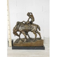 Sculpture "Boys playing on a mare"